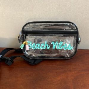 Fannypack, or cross body bag.